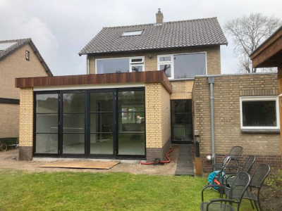 Aanbouw woning en nieuwe gevelbekleding